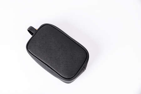 A black leather bag on a white backgroundの写真素材