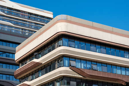 Part of modern urban glass mixed buildings is in blue sky and good weatherのeditorial素材