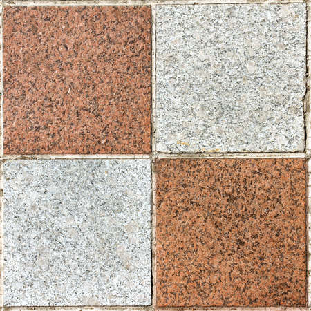 square texture of four marble white and brown tiles の写真素材