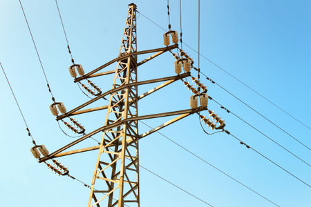 Power line on the clear blue sky background