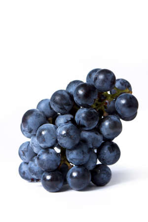 Bunch of a fresh grapes isolated on white の写真素材