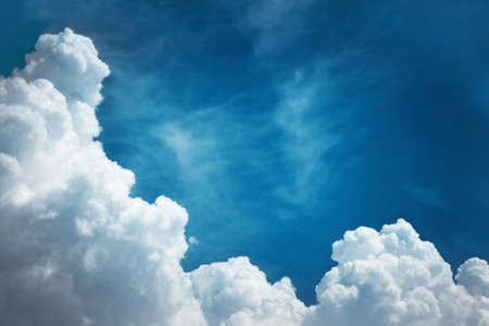A big cloud on a deep blue skyの写真素材