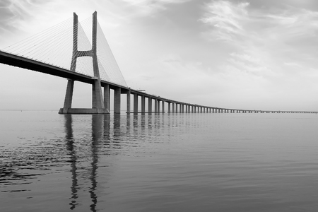 Long Bridge   Vaska da Gama   at sunset in Lisbon, Portugal  monochromatic pictureの写真素材