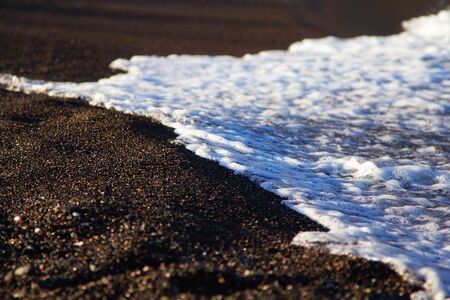 Volcanic beach of Perissa, Santorini, Greeceの写真素材