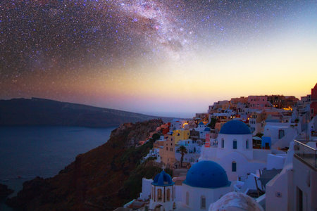 Magnificent view of the city of Oia on the island of Santorini Greece during a beautiful sunset in...