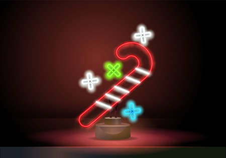 Neon Christmas candy cane icon in neon style. Traditional sweet symbol on dark background. Candy cane neon sign. Glowing candy icon. New Year and Christmas concept.のイラスト素材