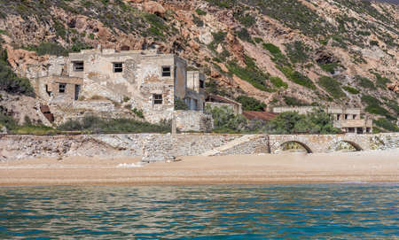 Abandoned old sulphur quarry 'Thiorichia' in Milos Island, Greece. The mines were destroyed during the WWII occupation by German troops in 1945. Later efforts to reopen them failed and the mines closed permanently by 1950.のeditorial素材