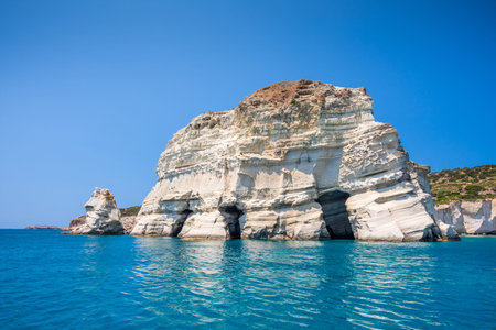 Rock formations and sea caves at Kleftiko shoreline in Milos, Greeceの写真素材
