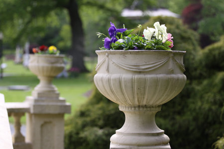 Decorative vase with flowers in the form of a flowerbedの写真素材