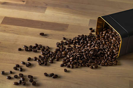 Close-up of roasted coffee beans on wooden backgroundの写真素材
