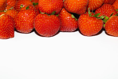 Fresh red beautiful strawberries on white backgroundの写真素材