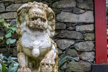 Asian lion sculpture in Madeira gardenの写真素材