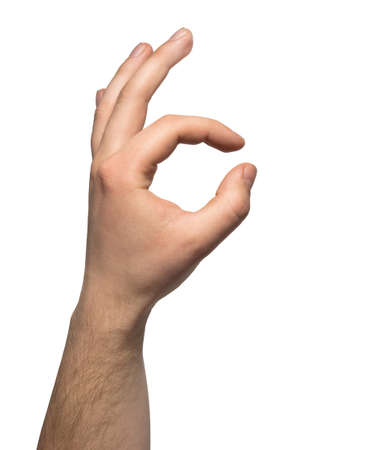 Okay male hand gesture sign isolated over white backgroundの写真素材