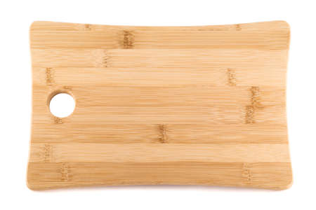 Wooden cutting board isolated over white backgroundの写真素材