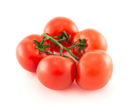 Bunch of five red tomato with shadow isolated over white backgroundの写真素材