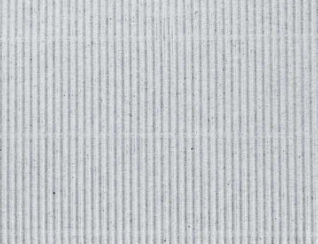Photo of corrugated grey cardboard as abstract background front viewの写真素材
