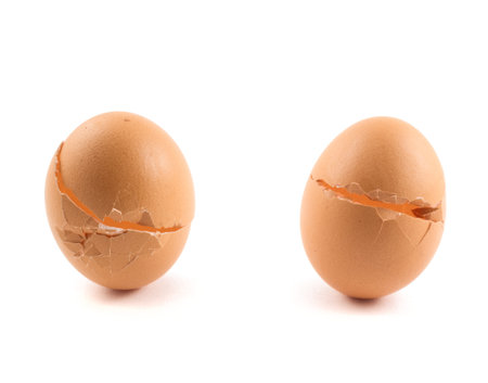 Cracked egg shells isolated over white background, set of two