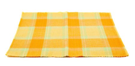 Cloth orange fabric serving mat isolated over white backgroundの写真素材