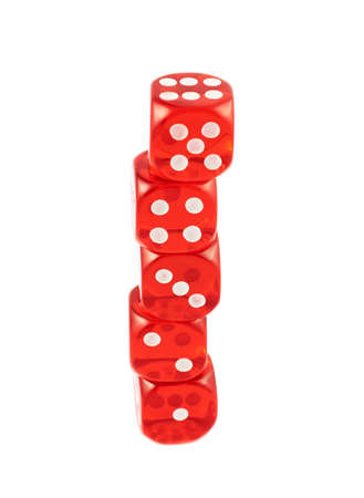 Pile of red playing dices isolated over white backgroundの写真素材