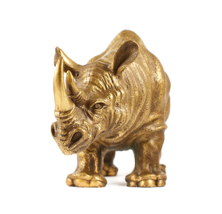 Rhinoceros rhino sculpture made of cast metal isolated over white backgroundの写真素材