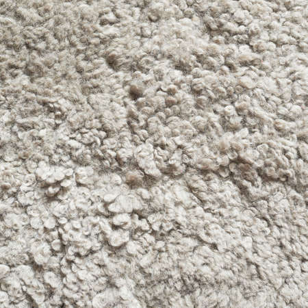 White shaggy carpet fragment as a background textureの写真素材