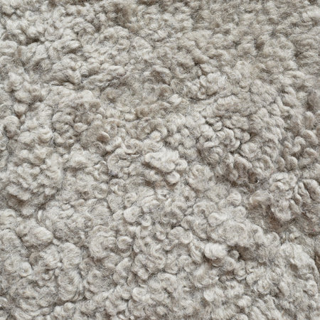 White shaggy carpet fragment as a background textureの写真素材