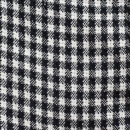 Squared black and white cloth material texture as a background