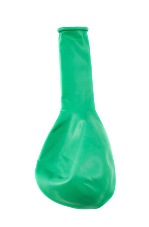 Not inflated green air balloon isolated over white backgroundの写真素材