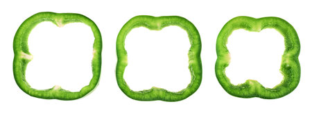 Set of sliced green bell pepper section pieces isolated over white