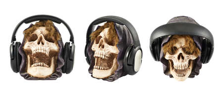 Headphones put on a ceramic skull head isolated over white background, set of three foreshorteningsの写真素材