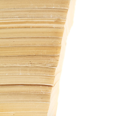 Stack of old books over white background
