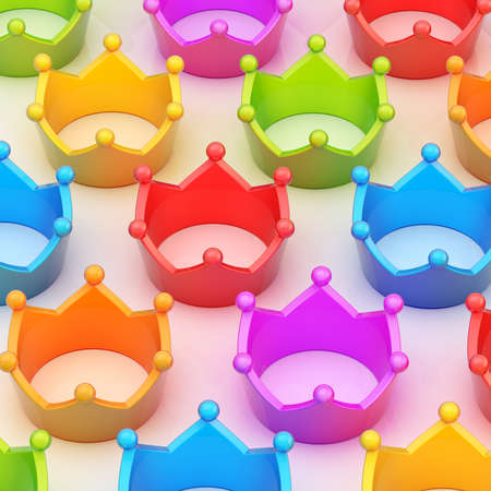 Colorful crowns over the white surface as an abstract background compositionの写真素材