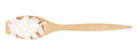 Wooden spoon full of coconutの写真素材