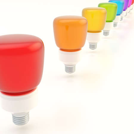 Line of colorful light bulbs over the white surface compositionの写真素材