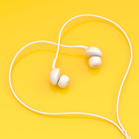 In-ear white headphones forming a heart shape over the yellow surface