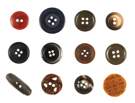 Set of multiple sew-through cloth buttons isolated over the white backgroundの写真素材