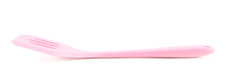 Pink cooking silicone spatula isolated over the white backgroundの写真素材