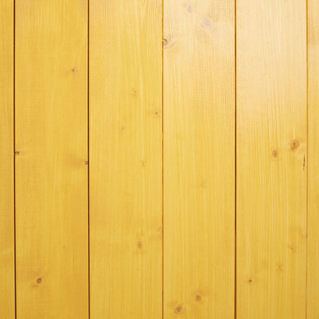 Recently painted in yellow wooden pine boards as a background texture composition