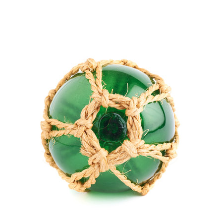 Green Christmas decoration ball made of glass and rope, isolated over the white background