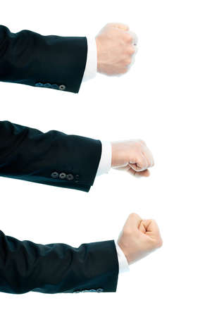 Dressed in a business suit caucasian male hand gesture of a clenched fist, high-key light composition isolated over the white background, set of three imagesの写真素材