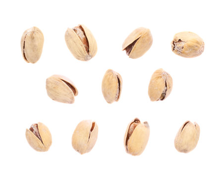 Set of multiple single pistachios isolated over the white backgroundの写真素材