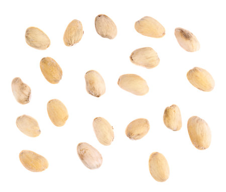 Multiple pistachio shells isolated over the white background