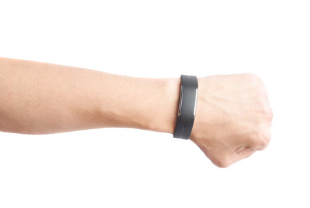 Caucasian male hand in a black sport band smart watch, composition isolated over the white backgroundの写真素材