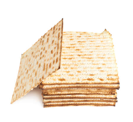 Pile of machine made matza flatbread, composition isolated over the white backgroundの写真素材