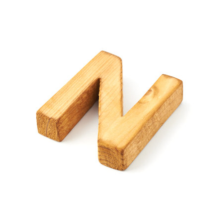 Single capital block wooden letter N isolated over the white backgroundの写真素材