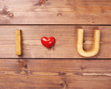 I love you written as I, Heart, U over the wooden background, Valentines day compositionの写真素材