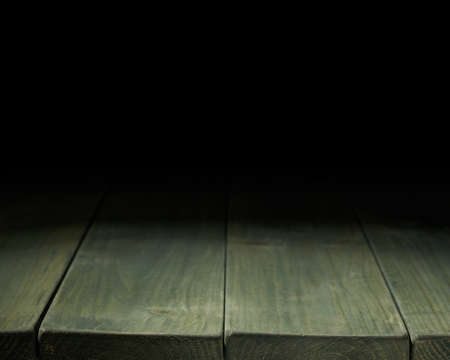 Dark green paint coated wooden boards copyspace background composition with the low key lightingの写真素材