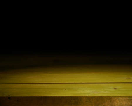 Green paint coated wooden boards copyspace background composition with the low key lightingの写真素材