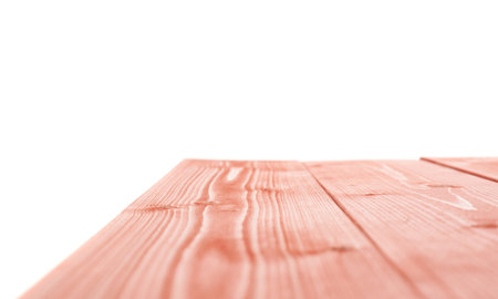 Red paint coated wooden pine boards as a copyspace background composition isolated over the white...