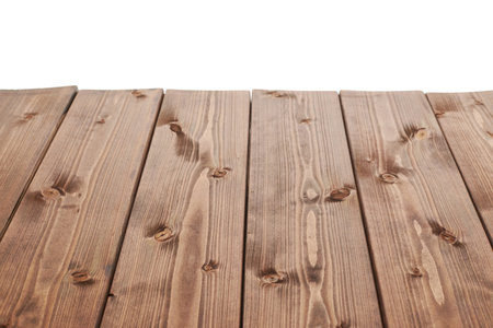 Dark brown paint coated wooden pine boards as a copyspace background composition isolated over the...